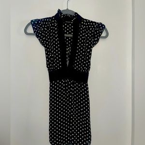Dressy casual shirt/blouse. Black and white polkadots. Sheer.